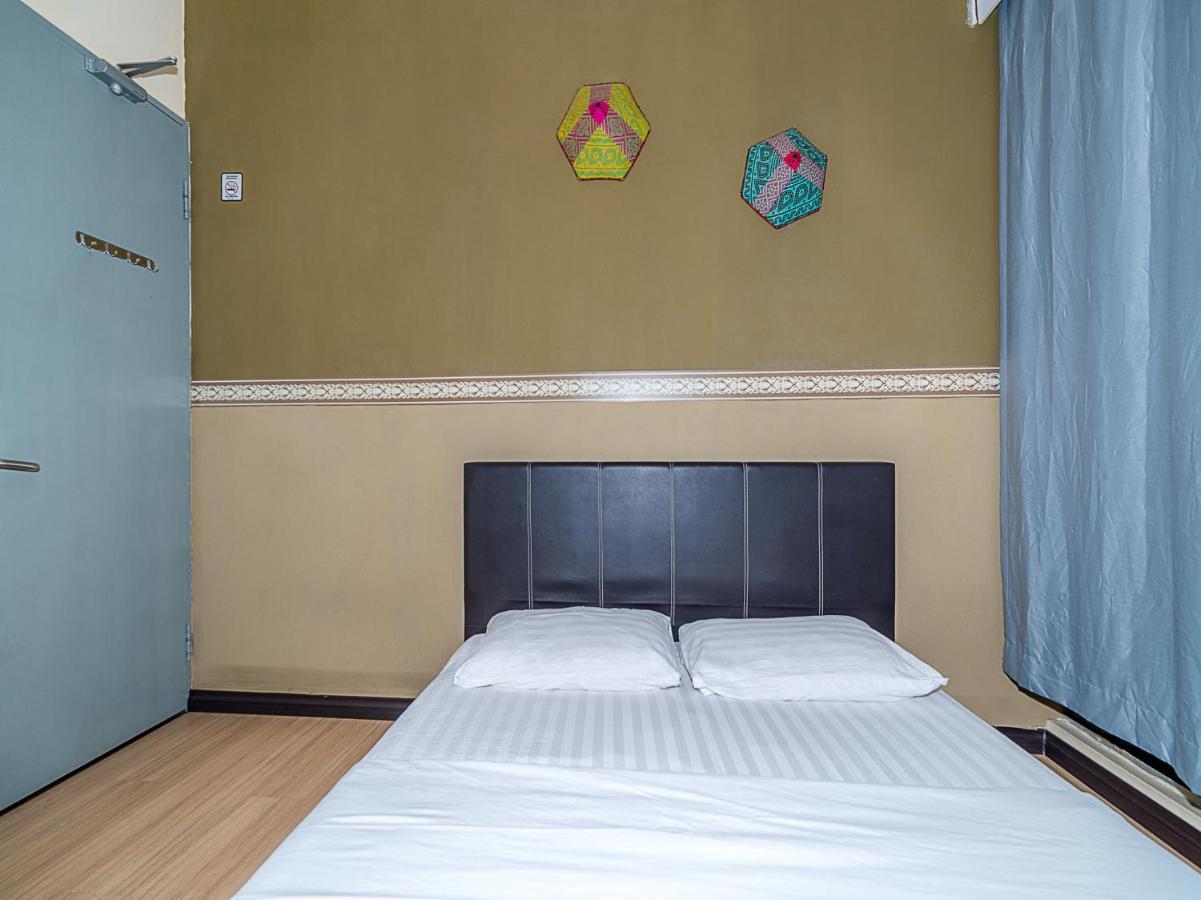 Spot On 90042 One Plaza Eco Hotel クニンガウ エクステリア 写真